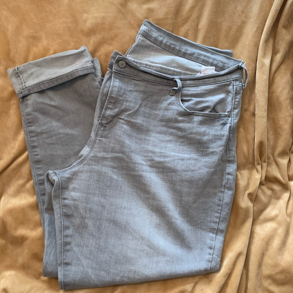 Gray mid rise skinny jeans